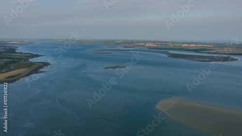 Saltmills, County Wexford, Ireland, September 2024. Drone ascends while orbiting clockwise over Bannow Bay, revealing the surrounding areas of Saltmills, Bannow Island, and The Windy Gap countryside photo