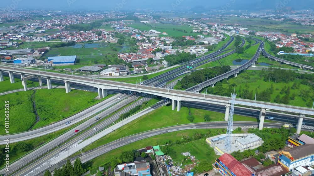 Title	
Established Aerial View of Pasir Koja Interchange, the meeting point of Soroja Toll Road, Purbaleunyi Toll Road and Jakarta-Bandung High Speed ​​Rail Line, Bandung, Indonesia