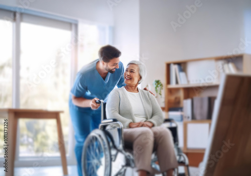 A man in blue scrubs smiles at an older woman sitting in a wheelchair.