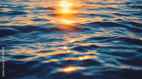 Warm sunset light reflecting on calm ocean water