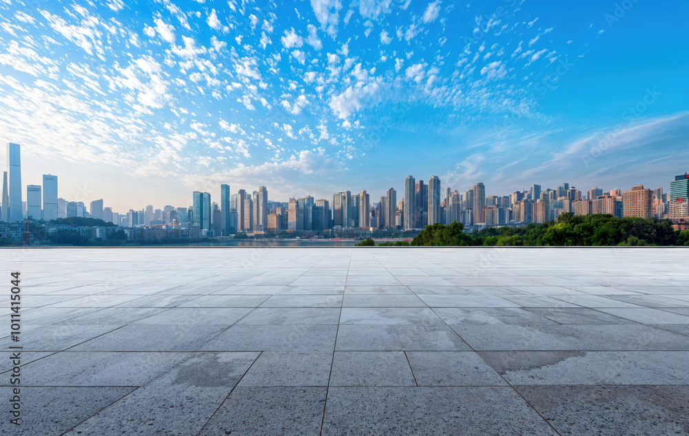 Empty marble floor overlooking modern city skyline with blue sky Empty marble floor overlooking modern city skyline with blue sky