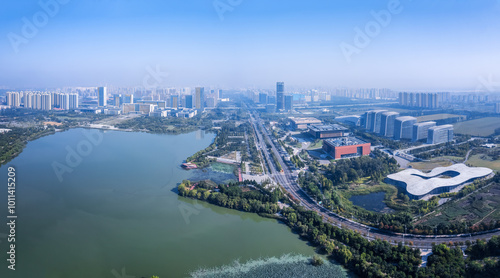 Aerial View of a Modern Urban Landscape with Lake and Parks