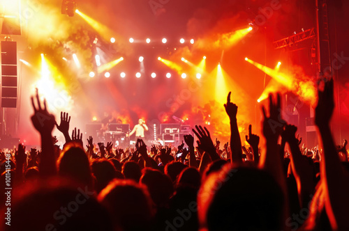 Wallpaper Mural concert scene with a cheering crowd illuminated by colorful lights, capturing the energy and excitement of live music. Torontodigital.ca