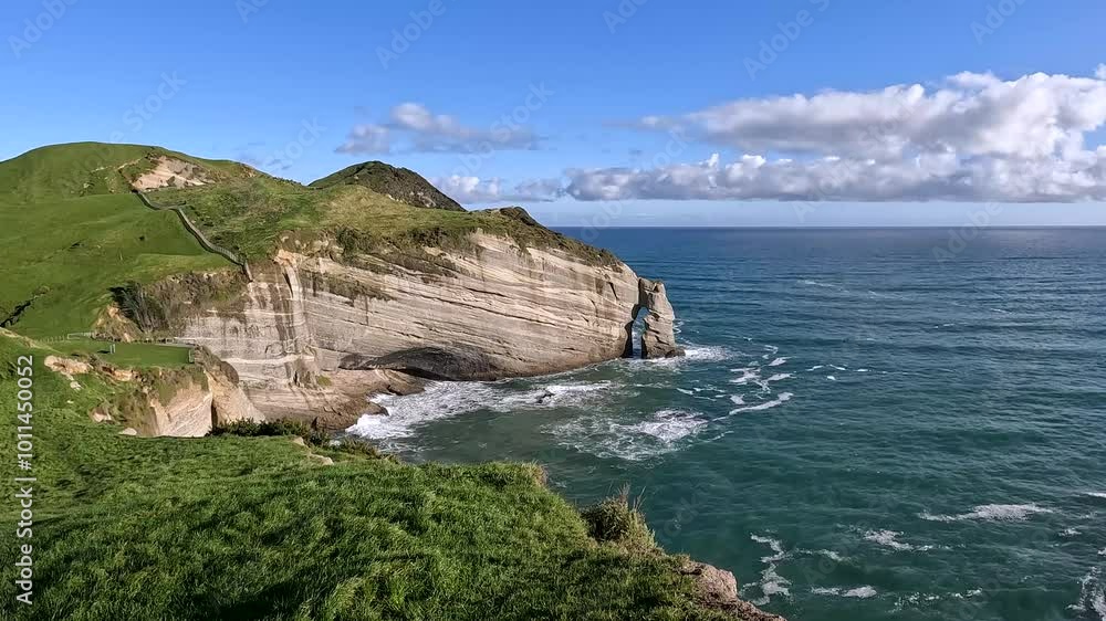 Cape Farewell Track Coastal Landscape : Lush Green Rolling Hills and Cliffs Overlooking Golden Bay at Cape Farewell, New Zealand Cape Farewell Track Coastal Landscape : Lush Green Rolling Hills and Cliffs Overlooking Golden Bay at Cape Farewell, New Zealand