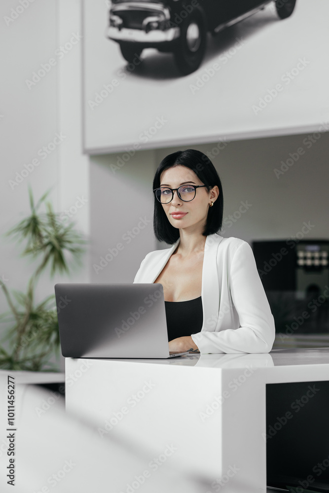 Sales woman use smartphone, have business call at car showroom. Car dealership client service and parts. Business Process and Problem Solving, Quality Control. Cell phone advise to choose, buy auto Sales woman use smartphone, have business call at car showroom. Car dealership client service and parts. Business Process and Problem Solving, Quality Control. Cell phone advise to choose, buy auto