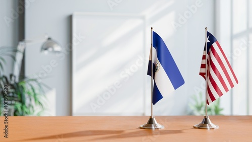 FLAGS OF EL SALVADOR AND LIBERIA ON TABLE photo