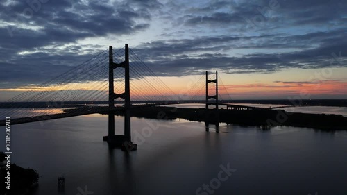 Dames Point Bridge over the St. Johns River at Sunrise with Traffic in Jacksonville, Florida USA photo