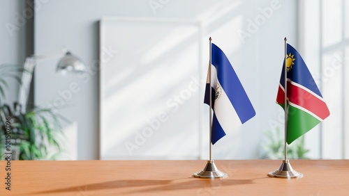 FLAGS OF EL SALVADOR AND NAMIBIA ON TABLE photo