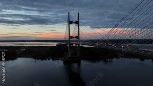 Dames Point Bridge over the St. Johns River at Sunrise with Traffic in Jacksonville, Florida USA photo