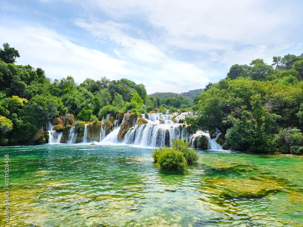 Gorgeous summer view of Krka National Park, Roski Slap location, Croatia, Europe. Beautiful world of Mediterranean countries. Traveling concept background. Gorgeous summer view of Krka National Park, Roski Slap location, Croatia, Europe. Beautiful world of Mediterranean countries. Traveling concept background.