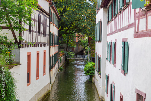 Street View of Medieval Buildings Alongside River in Basel, Switzerland