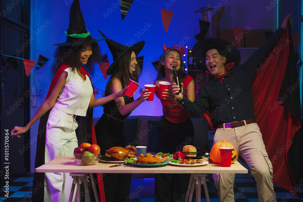 Dinner and group of people celebrating together at Halloween party. Dinner and group of people celebrating together at Halloween party.