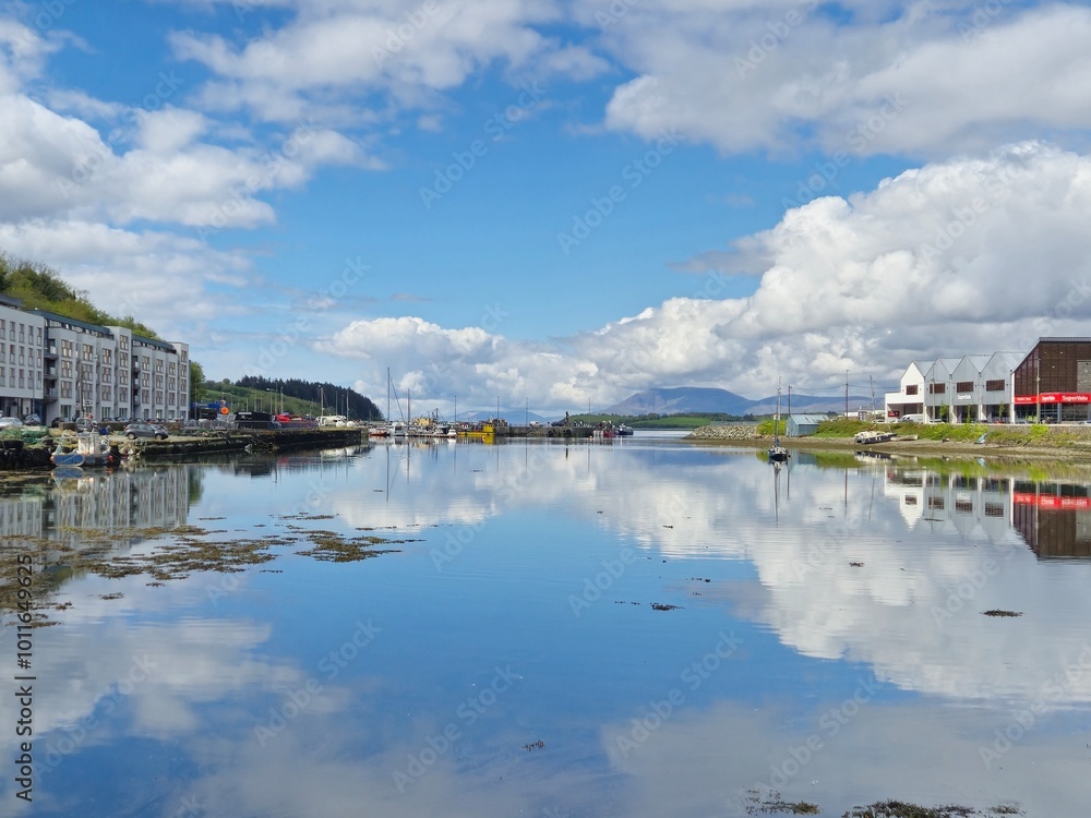 Serene River Landscape With Reflections And Gentle Waves Serene River Landscape With Reflections And Gentle Waves