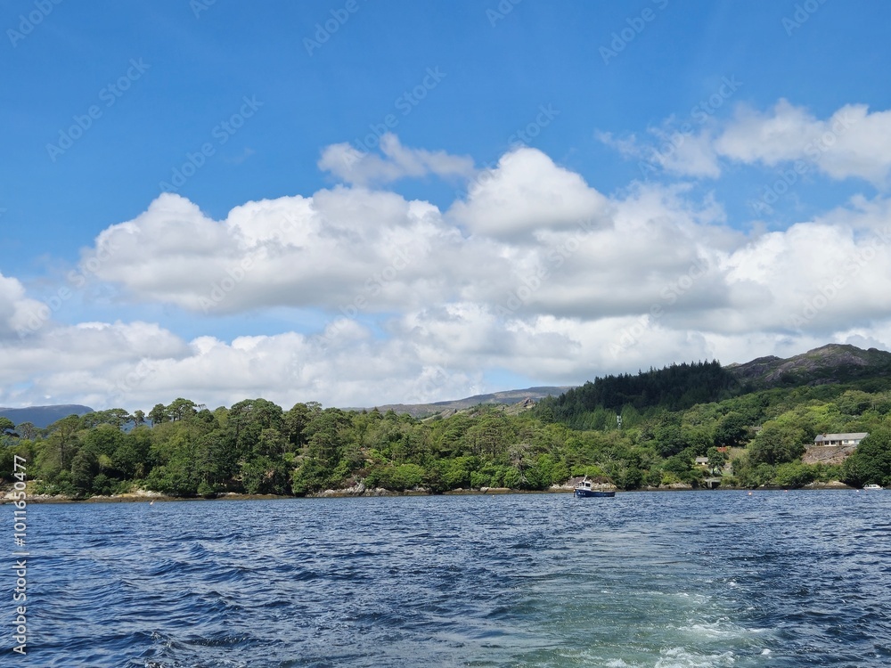 Serene Waterscape: Little Waves And Cloud Reflections On A Tranquil River Serene Waterscape: Little Waves And Cloud Reflections On A Tranquil River