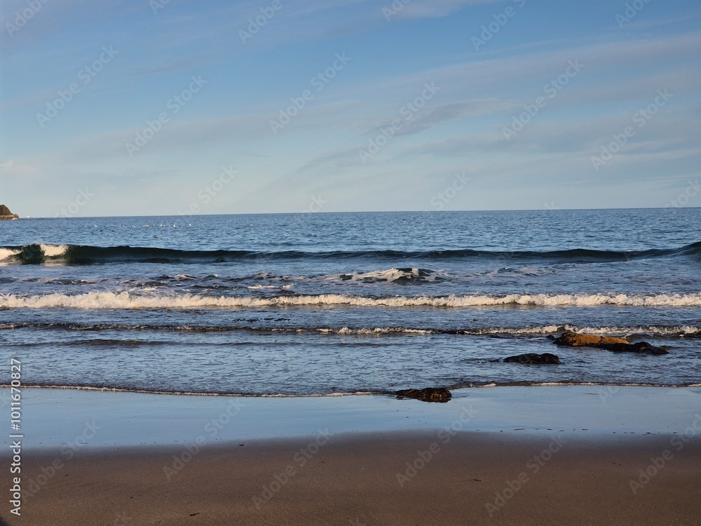 Summer Sunset Over Blue Ocean Waves At The Beach Summer Sunset Over Blue Ocean Waves At The Beach