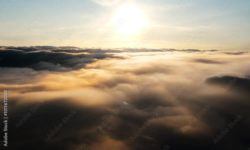 Sunburst Through Dramatic Rolling Cloudscape, Capturing the Dynamic Play of Light and Shadow in a Wide Shot Sunburst Through Dramatic Rolling Cloudscape, Capturing the Dynamic Play of Light and Shadow in a Wide Shot