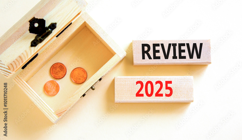 Planning review 2025 new year symbol. Concept words Review 2025 on beautiful wooden blocks. Beautiful white background. Wooden chest with coins. Business review 2025 new year concept. Copy space. Planning review 2025 new year symbol. Concept words Review 2025 on beautiful wooden blocks. Beautiful white background. Wooden chest with coins. Business review 2025 new year concept. Copy space.
