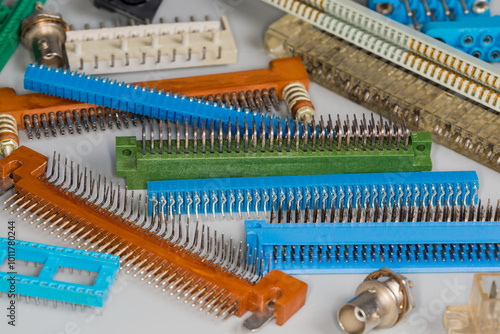 Heap of various electrical connectors for different purposes, selective focus photo