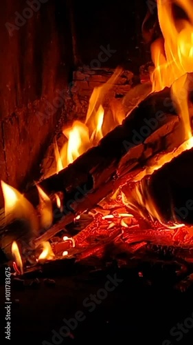 The fireplace burns and warms the house