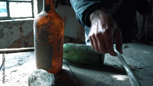 Abandoned chemical factory hand moving dusty old objects instruments