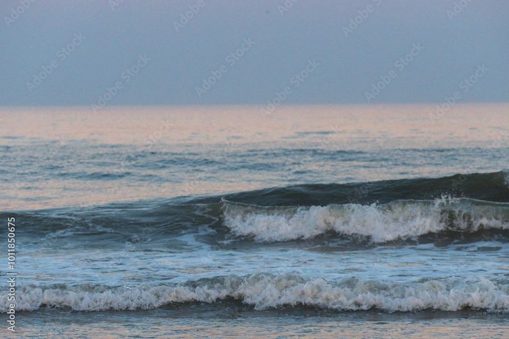 Avalon, New Jersey - Atlantic Ocean waves breaking onto the waters edge of this jersey shore beach at blue hour Avalon, New Jersey - Atlantic Ocean waves breaking onto the waters edge of this jersey shore beach at blue hour