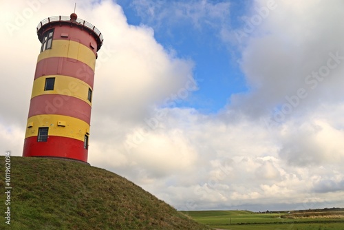 Der Pilsumer Leuchtturm in Ostfriesland photo