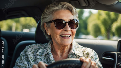 Happy senior woman driving a vehicle, enjoying a ride. Active life for elderly adults.