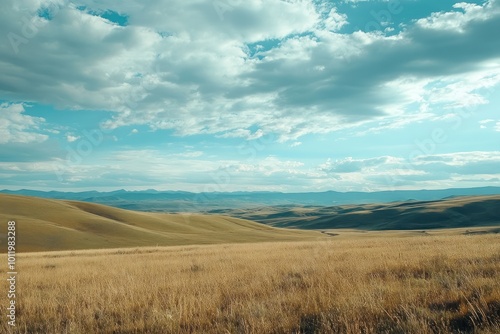 Scenic View of Rolling Hills and Distant Mountains