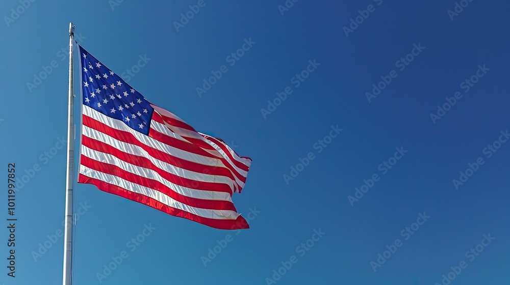 Majestic American Flag Fluttering Against a Pristine Blue Sky - Symbol of National Unity and Freedom. United States Flag Waving Proudly Against a Cloudless Sky - A Celebration of Freedom and Hope Majestic American Flag Fluttering Against a Pristine Blue Sky - Symbol of National Unity and Freedom. United States Flag Waving Proudly Against a Cloudless Sky - A Celebration of Freedom and Hope