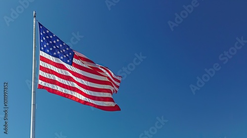 Majestic American Flag Fluttering Against a Pristine Blue Sky - Symbol of National Unity and Freedom. United States Flag Waving Proudly Against a Cloudless Sky - A Celebration of Freedom and Hope