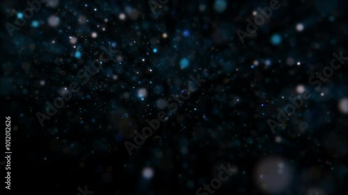 4k Blue Particles Explosion. Motion Background. Glitter particle. Isolated on black. Animated Overlay. Holiday theme. Christmas 2025 photo