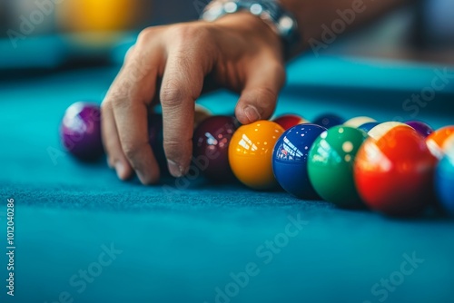 Hand arranging colorful billiard balls on table with focused precision, watch visible on wrist capturing moment of preparation before game begins, Generative AI photo