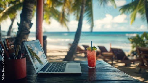 Laptop and Drink on a Tropical Beach