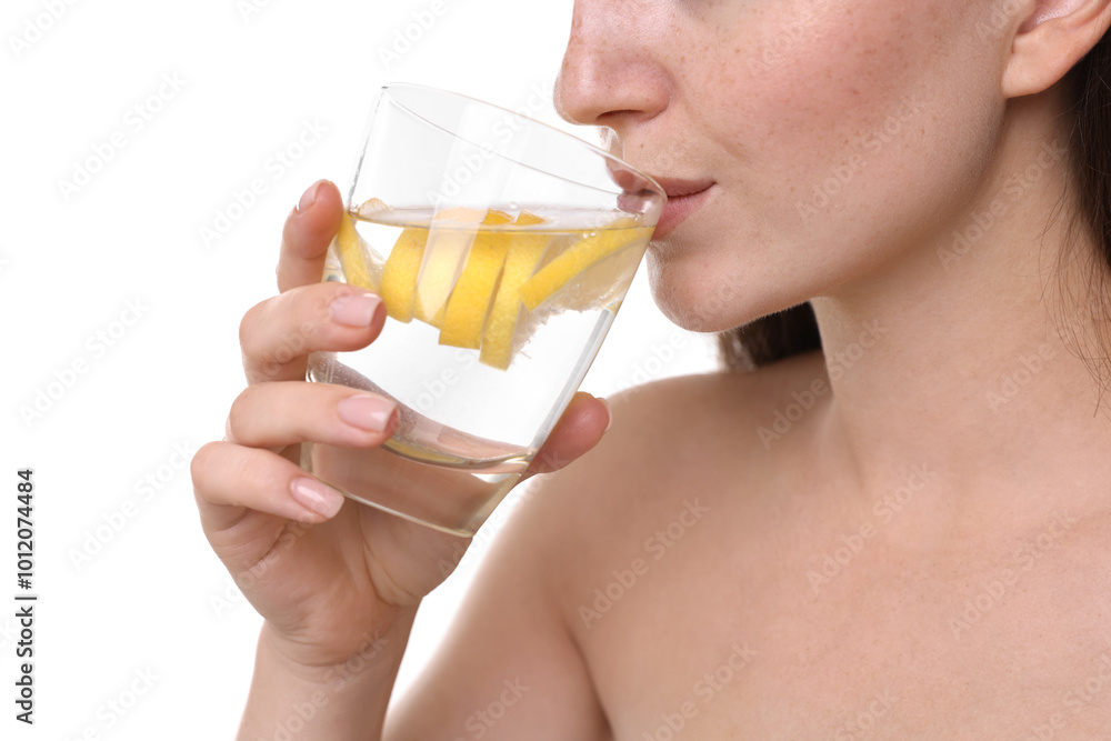 Woman drinking water with lemon on white background, closeup Woman drinking water with lemon on white background, closeup