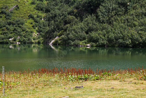 il Lago Moregna nella catena del Lagorai; Val di Fiemme, Trentino photo