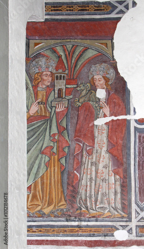 Le Sante Barbara e Margherita. Affresco nella chiesa dei Santi Filippo e Giacomo a Campitello; Val di Fassa, Trentino photo