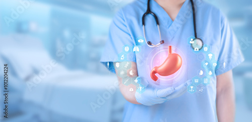 Doctor isolated on light blue background analyzes the stomach. Concept of digestive diseases and stomach cancer. Medicine specialized in gastroenterology.