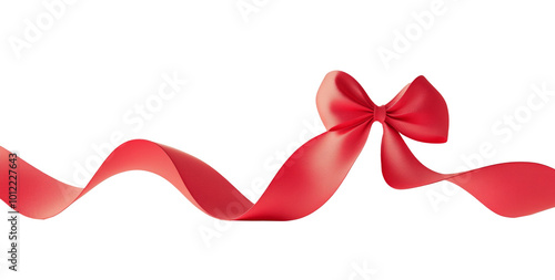 Elegant red ribbon twisted into a bow, resting on a simple white background