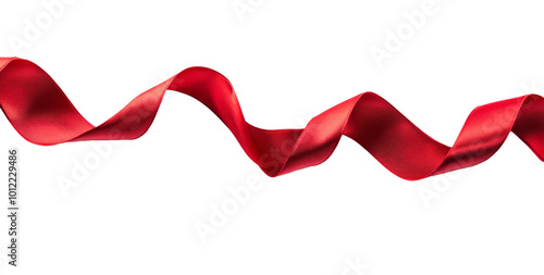 Elegant red ribbon swaying gracefully on a white background in soft lighting