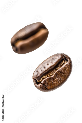 Coffee beans in mid-air showcasing their rich color and texture against a pla...
