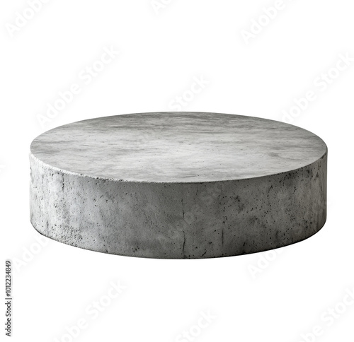 Modern concrete pedestal illuminated by natural light in a minimalist setting