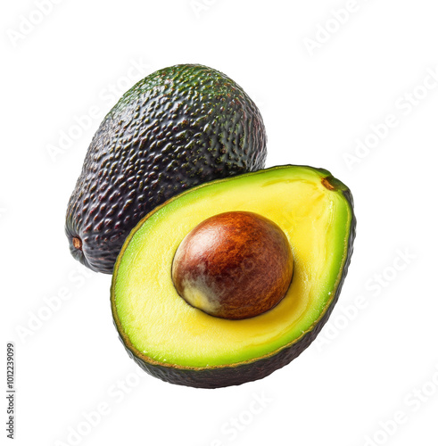 Ripe avocados cut open to reveal creamy interior and seed on a white background