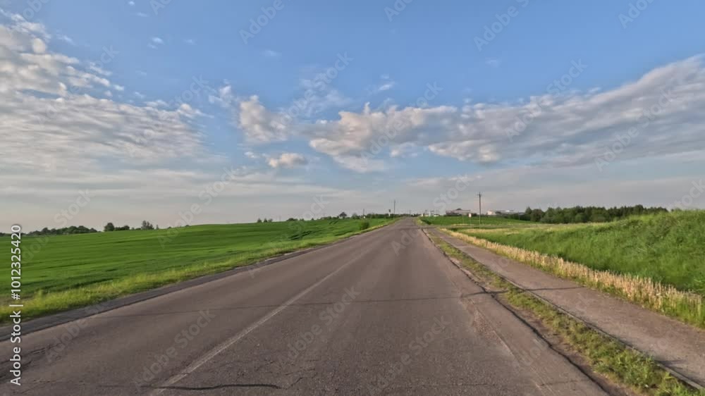 Road view on a summer day. Highways and cars, roadside and white road line markings. Road view on a summer day. Highways and cars, roadside and white road line markings.