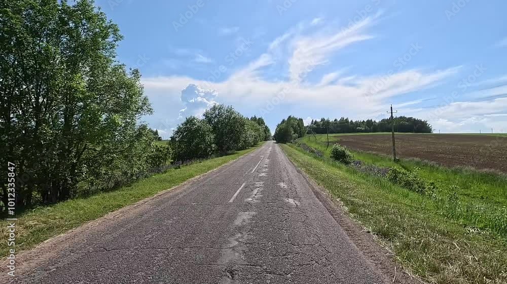 Road view on a summer day. Highways and cars, roadside and white road line markings. Road view on a summer day. Highways and cars, roadside and white road line markings.