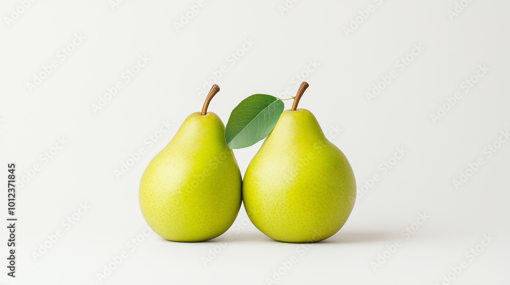 Two fresh green pears with single leaf on white background. Two fresh green pears with single leaf on white background.