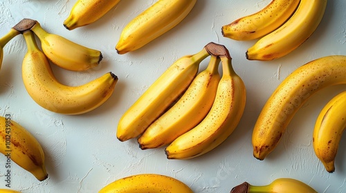 fresh banana set arranged beautifully against a crisp white background showcasing their vibrant yellow color and natural texture perfect for a culinary or healththemed visual photo