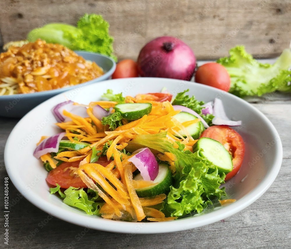 Fresh green lettuce health food and spaghetti Italian food Fresh green lettuce health food and spaghetti Italian food