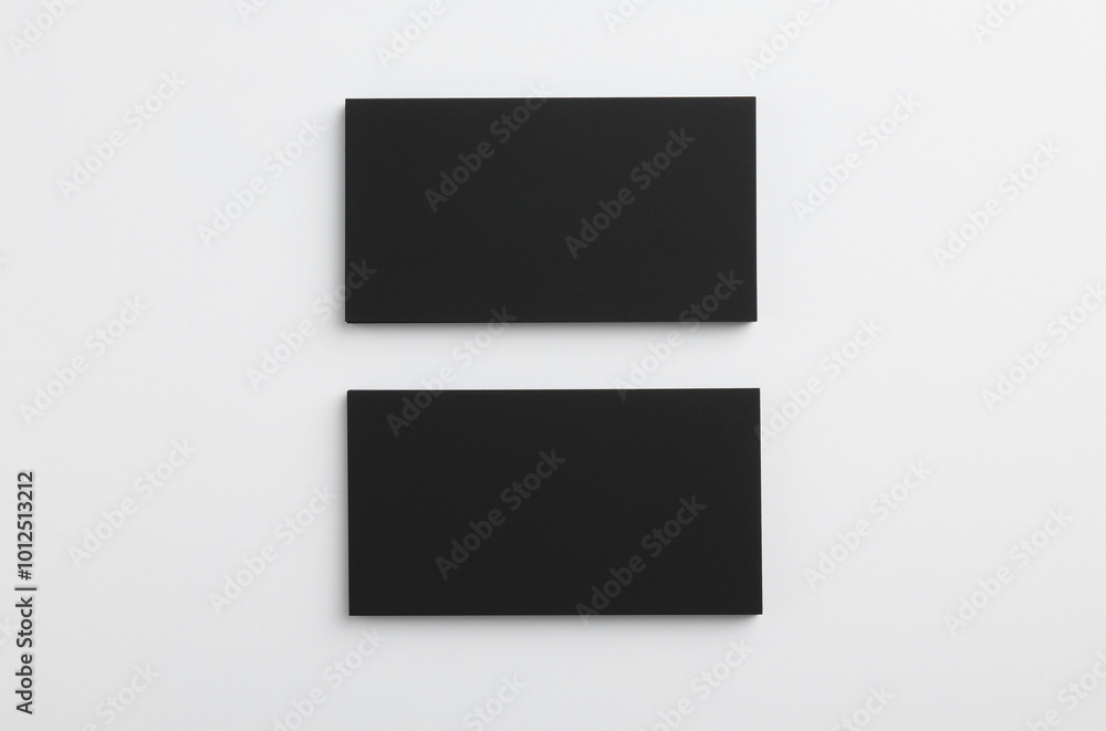 Blank business cards on light grey background, top view. Mockup for design Blank business cards on light grey background, top view. Mockup for design