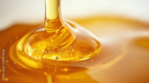 close-up, front view, the image of honey dripping on a white background