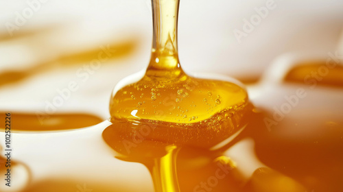 close-up, front view, the image of honey dripping on a white background